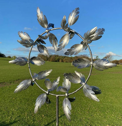 Kinetic metal windmill spinner for the garden